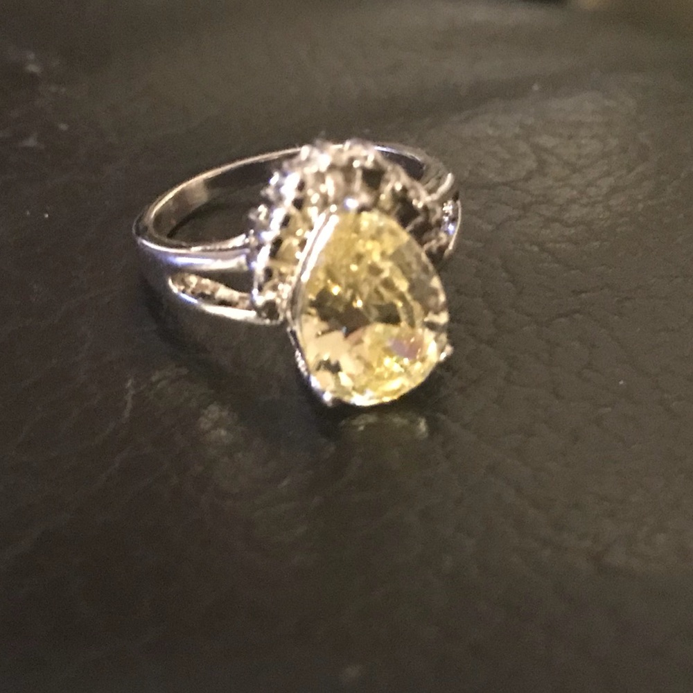 Light yellow gemstone colored tear drop ring